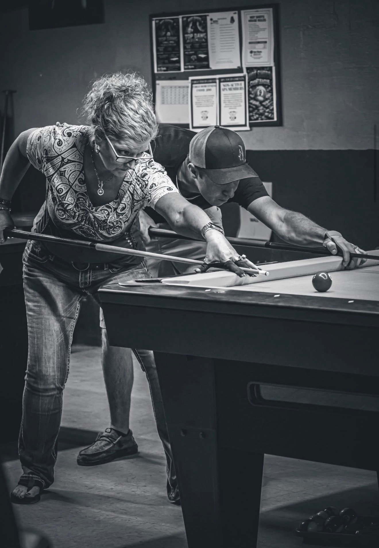Two players lining up their shots